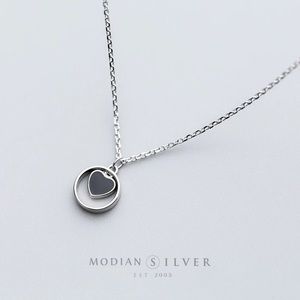 Black enamel heart in silver circle necklace